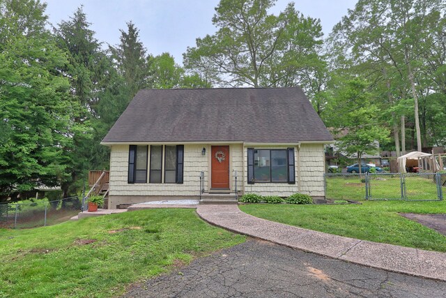 24 Cadbury Pl, Naugatuck, CT 06770 - view of front of property featuring roof with shingles