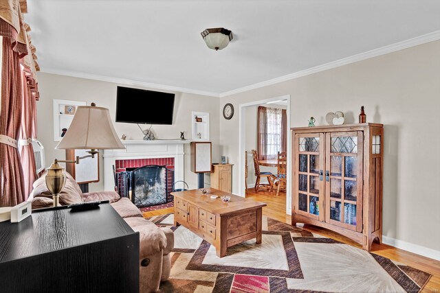 98 Morningside Dr W, Bristol, CT 06010 - living room featuring ornamental molding, a fireplace, and wood finished floors