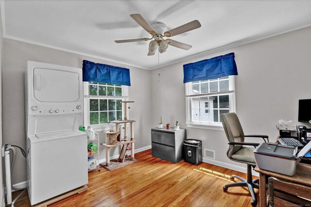98 Morningside Dr W, Bristol, CT 06010 - office with stacked washing machine and dryer, a ceiling fan, ornamental molding, and light wood finished floors