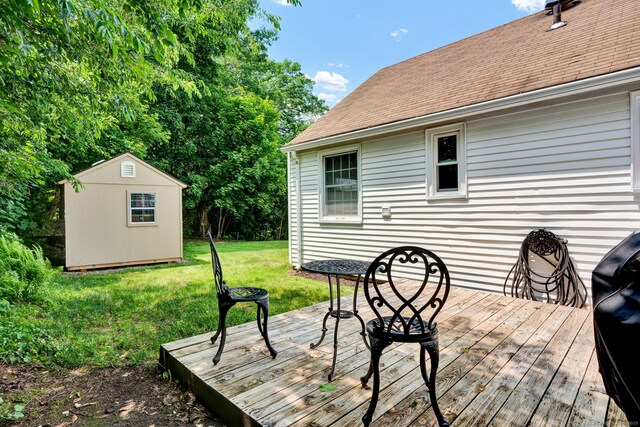 98 Morningside Dr W, Bristol, CT 06010 - wooden terrace featuring a lawn and a storage shed