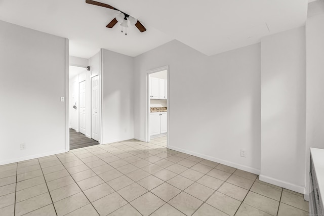 80 Cartright St Unit Gc, Bridgeport, CT 06604 - empty room with ceiling fan and light tile patterned floors