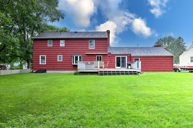 31 Meadowview Dr, Trumbull, CT 06611 - rear view of house featuring a deck, a yard, and roof with shingles