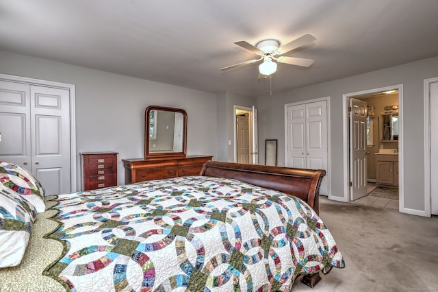 31 Meadowview Dr, Trumbull, CT 06611 - carpeted bedroom with ceiling fan, connected bathroom, multiple closets, and tile patterned floors