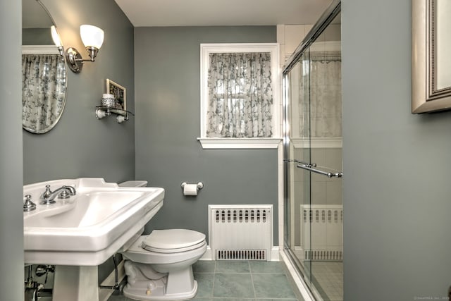 31 Meadowview Dr, Trumbull, CT 06611 - full bath with radiator heating unit, a shower stall, and tile patterned floors