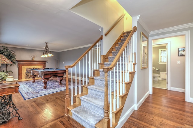 31 Meadowview Dr, Trumbull, CT 06611 - stairs featuring pool table, radiator, wood finished floors, and crown molding
