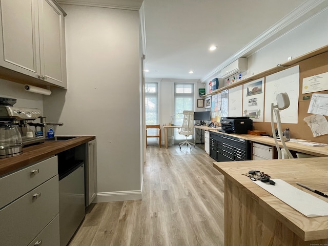 4 Armonk St, Greenwich, CT 06830 - kitchen featuring butcher block counters, ornamental molding, light wood finished floors, open shelves, and built in desk
