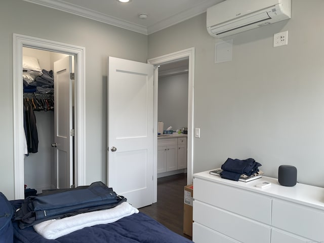 4 Armonk St, Greenwich, CT 06830 - bedroom with a wall mounted air conditioner, crown molding, dark wood finished floors, a closet, and a spacious closet