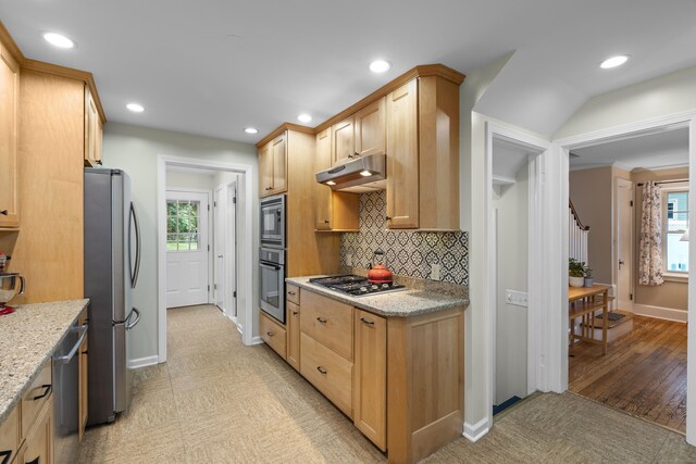 51 Carmel St, Hamden, CT 06518 - kitchen with appliances with stainless steel finishes, under cabinet range hood, healthy amount of natural light, tasteful backsplash, and recessed lighting