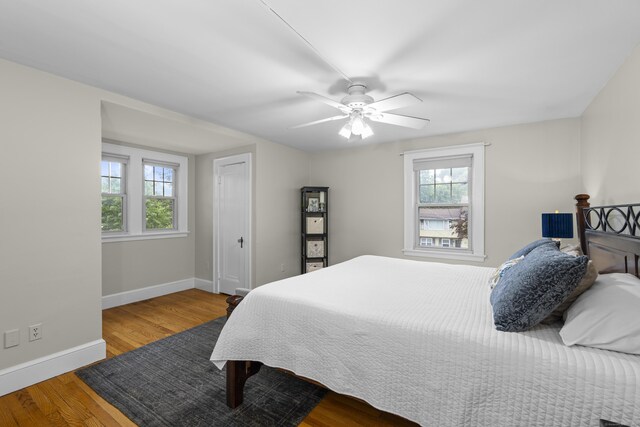 51 Carmel St, Hamden, CT 06518 - bedroom with multiple windows, wood finished floors, and a ceiling fan