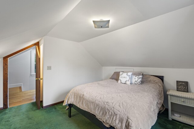 51 Carmel St, Hamden, CT 06518 - carpeted bedroom featuring vaulted ceiling and baseboards