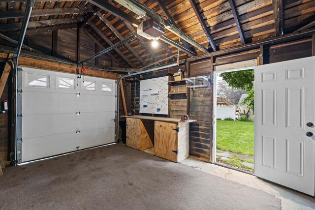 51 Carmel St, Hamden, CT 06518 - garage with a garage door opener and wooden ceiling
