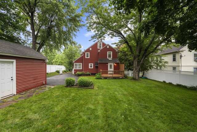 51 Carmel St, Hamden, CT 06518 - view of yard with a wooden deck, driveway, and an outdoor structure