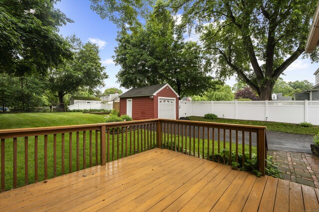 51 Carmel St, Hamden, CT 06518 - wooden deck featuring an outbuilding and a detached garage