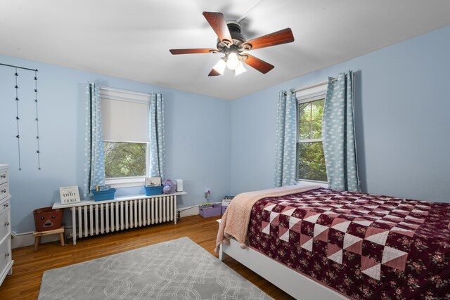 51 Carmel St, Hamden, CT 06518 - bedroom featuring radiator, wood finished floors, and a ceiling fan
