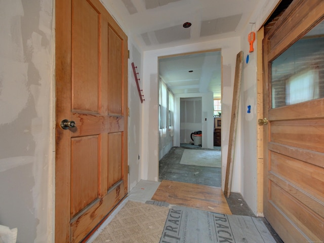 291 Cossaduck Hill Rd, North Stonington, CT 06359 - corridor featuring light wood-style flooring