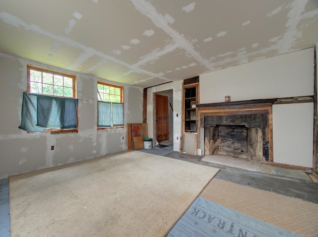 291 Cossaduck Hill Rd, North Stonington, CT 06359 - unfurnished living room featuring a high end fireplace