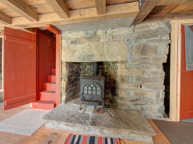 291 Cossaduck Hill Rd, North Stonington, CT 06359 - detailed view of a wood stove and wood finished floors