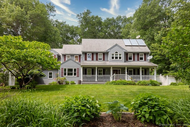 328 Old Marlborough Tpke, Portland, CT 06480 - view of front of property with solar panels, a porch, a front lawn, and a shingled roof