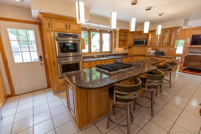 328 Old Marlborough Tpke, Portland, CT 06480 - kitchen featuring appliances with stainless steel finishes, light tile patterned flooring, open shelves, and a breakfast bar area