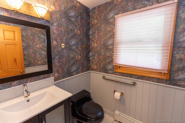 328 Old Marlborough Tpke, Portland, CT 06480 - half bath with a wainscoted wall, vanity, and wallpapered walls