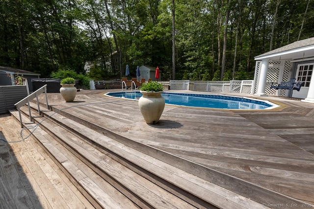 328 Old Marlborough Tpke, Portland, CT 06480 - outdoor pool featuring a deck and a storage unit