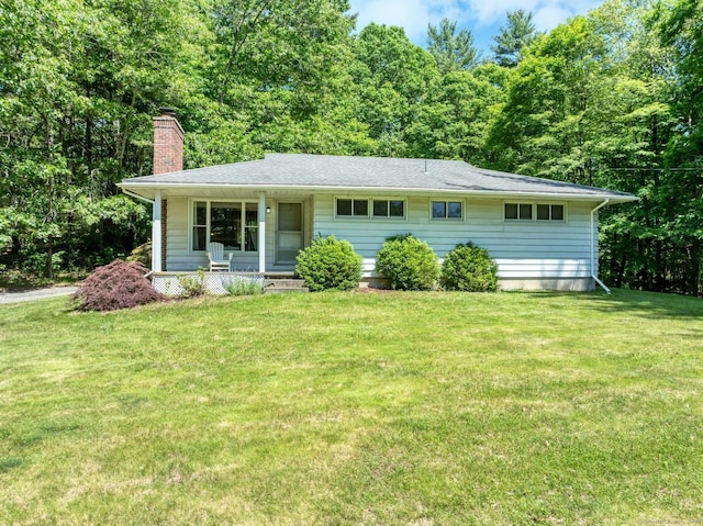 123 Geer Rd, Griswold, CT 06351 - ranch-style house featuring covered porch, a chimney, and a front yard