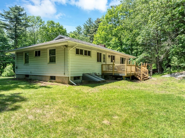 123 Geer Rd, Griswold, CT 06351 - rear view of house with a deck and a lawn