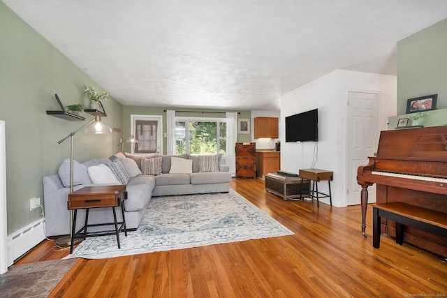 123 Geer Rd, Griswold, CT 06351 - living room featuring baseboard heating and wood finished floors