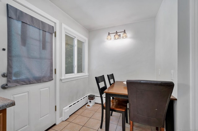 123 Geer Rd, Griswold, CT 06351 - dining room featuring light tile patterned floors and a baseboard radiator