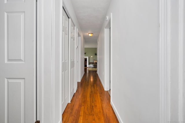 123 Geer Rd, Griswold, CT 06351 - hallway with wood finished floors and baseboards