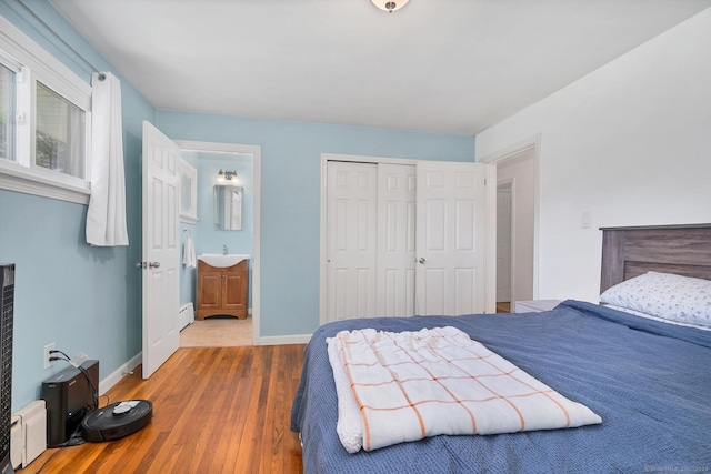 123 Geer Rd, Griswold, CT 06351 - bedroom featuring hardwood / wood-style floors, a closet, and ensuite bathroom