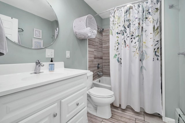 123 Geer Rd, Griswold, CT 06351 - full bath featuring vanity, shower / bath combination with curtain, wood finished floors, and baseboard heating