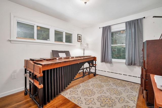 123 Geer Rd, Griswold, CT 06351 - office with wood finished floors and a baseboard heating unit
