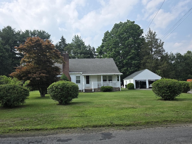 55 Defashion St, Southington, CT 06479 - view of front of house with covered porch, a front lawn, and a chimney