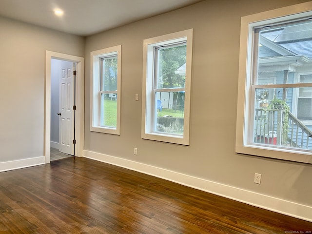 218 Charles St, Waterbury, CT 06708 - spare room with healthy amount of natural light and dark wood-style flooring