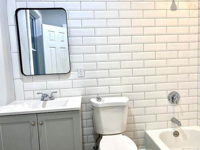 218 Charles St, Waterbury, CT 06708 - full bath with vanity, decorative backsplash, and tub / shower combination