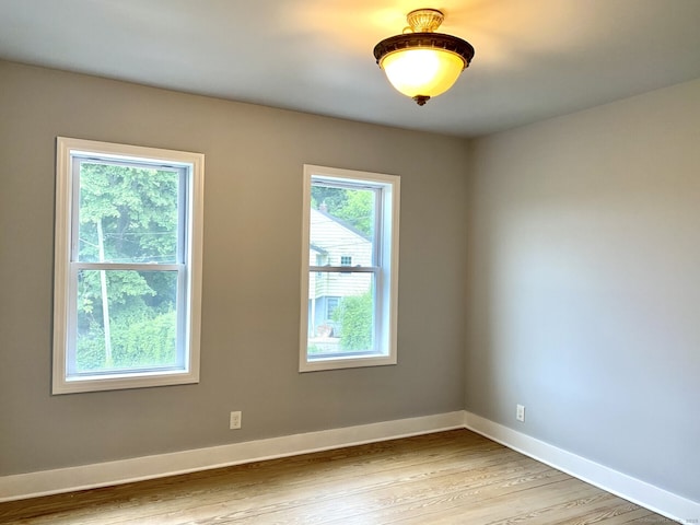 218 Charles St, Waterbury, CT 06708 - unfurnished room with wood finished floors and baseboards