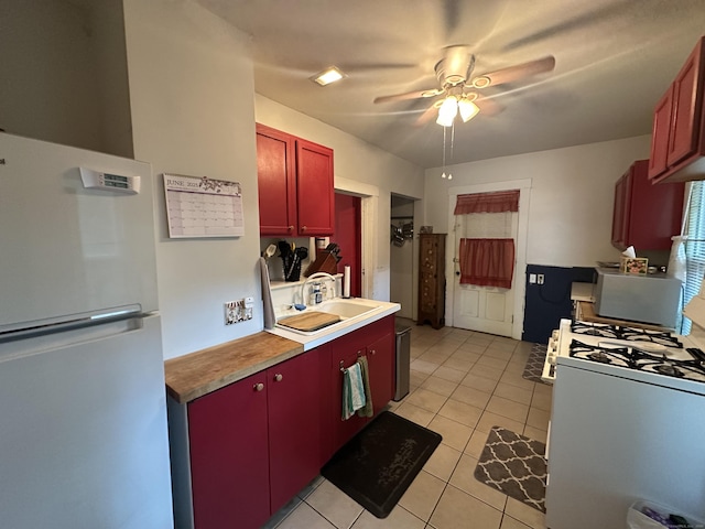 813 Russell St, New Haven, CT 06513 - kitchen with white appliances, ceiling fan, light tile patterned floors, and light countertops
