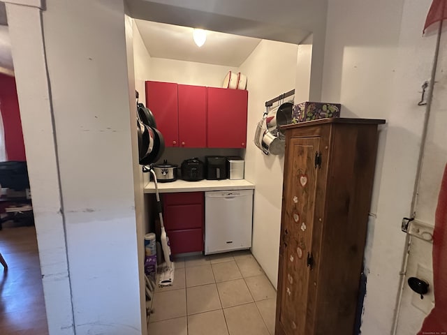 813 Russell St, New Haven, CT 06513 - kitchen featuring dishwasher, red cabinetry, and light tile patterned floors