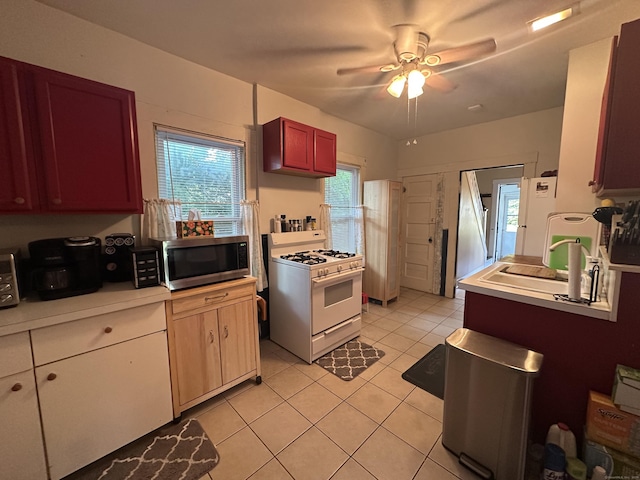 813 Russell St, New Haven, CT 06513 - kitchen with white appliances, light tile patterned flooring, light countertops, and ceiling fan