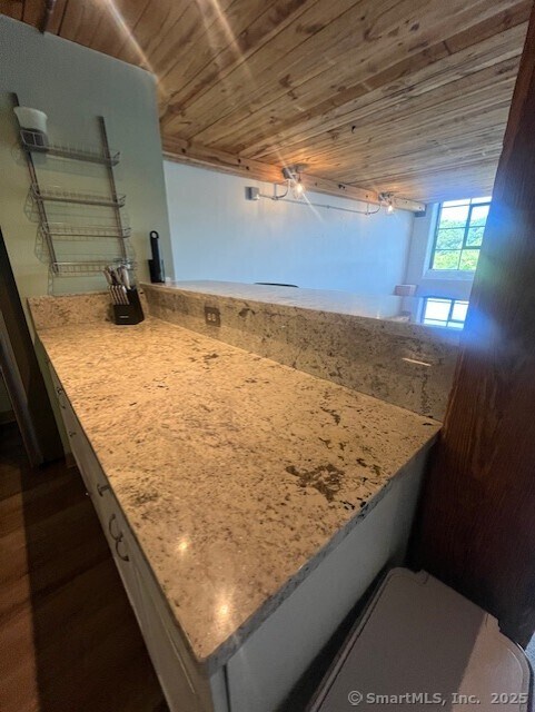 68 Thermos Ave Unit 206B, Norwich, CT 06360 - detailed view of wooden ceiling and wood finished floors