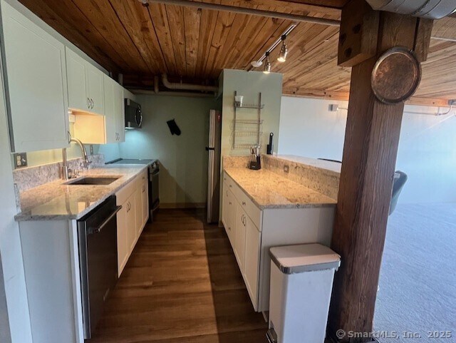 68 Thermos Ave Unit 206B, Norwich, CT 06360 - kitchen with dishwasher, black microwave, wooden ceiling, white cabinetry, and electric stove