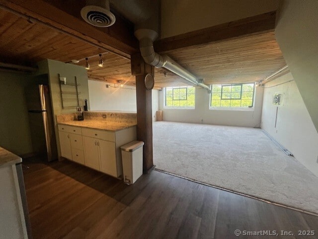 68 Thermos Ave Unit 206B, Norwich, CT 06360 - kitchen with freestanding refrigerator, dark wood-type flooring, light countertops, white cabinets, and wooden ceiling