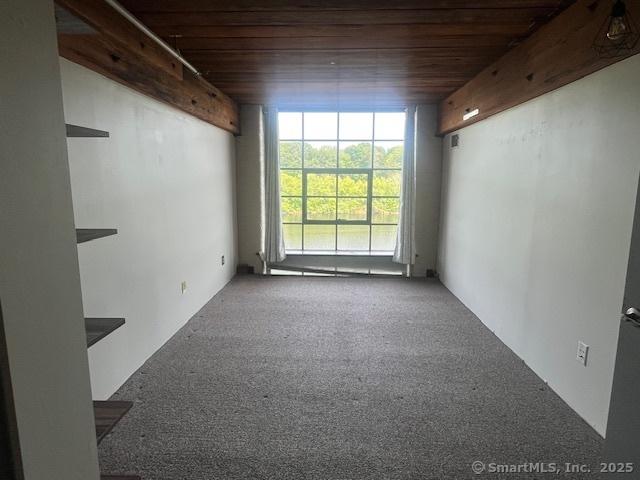 68 Thermos Ave Unit 206B, Norwich, CT 06360 - unfurnished room with wood ceiling and carpet flooring