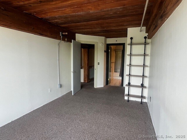 68 Thermos Ave Unit 206B, Norwich, CT 06360 - carpeted empty room featuring wood ceiling