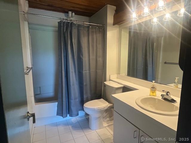 68 Thermos Ave Unit 206B, Norwich, CT 06360 - full bath with tile patterned floors, vanity, and shower / bathtub combination with curtain