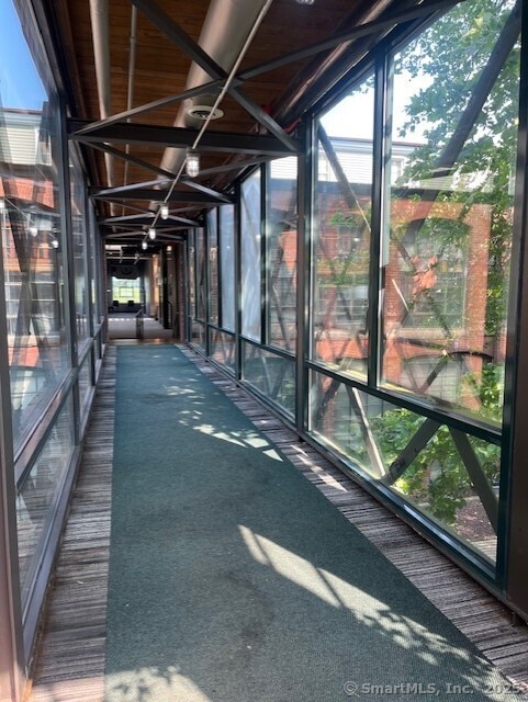 68 Thermos Ave Unit 206B, Norwich, CT 06360 - unfurnished sunroom featuring healthy amount of natural light