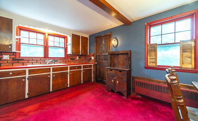 3 Fairview Hts, Cromwell, CT 06416 - kitchen featuring radiator, dark carpet, plenty of natural light, beam ceiling, and wallpapered walls