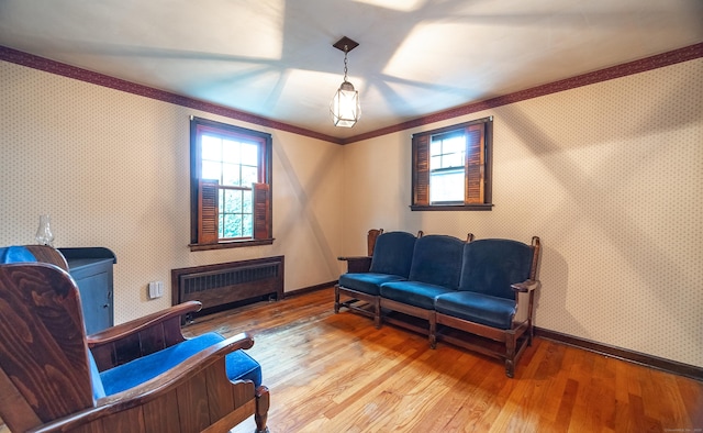 3 Fairview Hts, Cromwell, CT 06416 - sitting room with radiator, hardwood / wood-style floors, wallpapered walls, and crown molding
