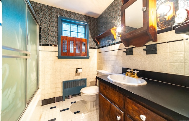 3 Fairview Hts, Cromwell, CT 06416 - full bathroom featuring radiator, tile patterned flooring, vanity, tile walls, and enclosed tub / shower combo